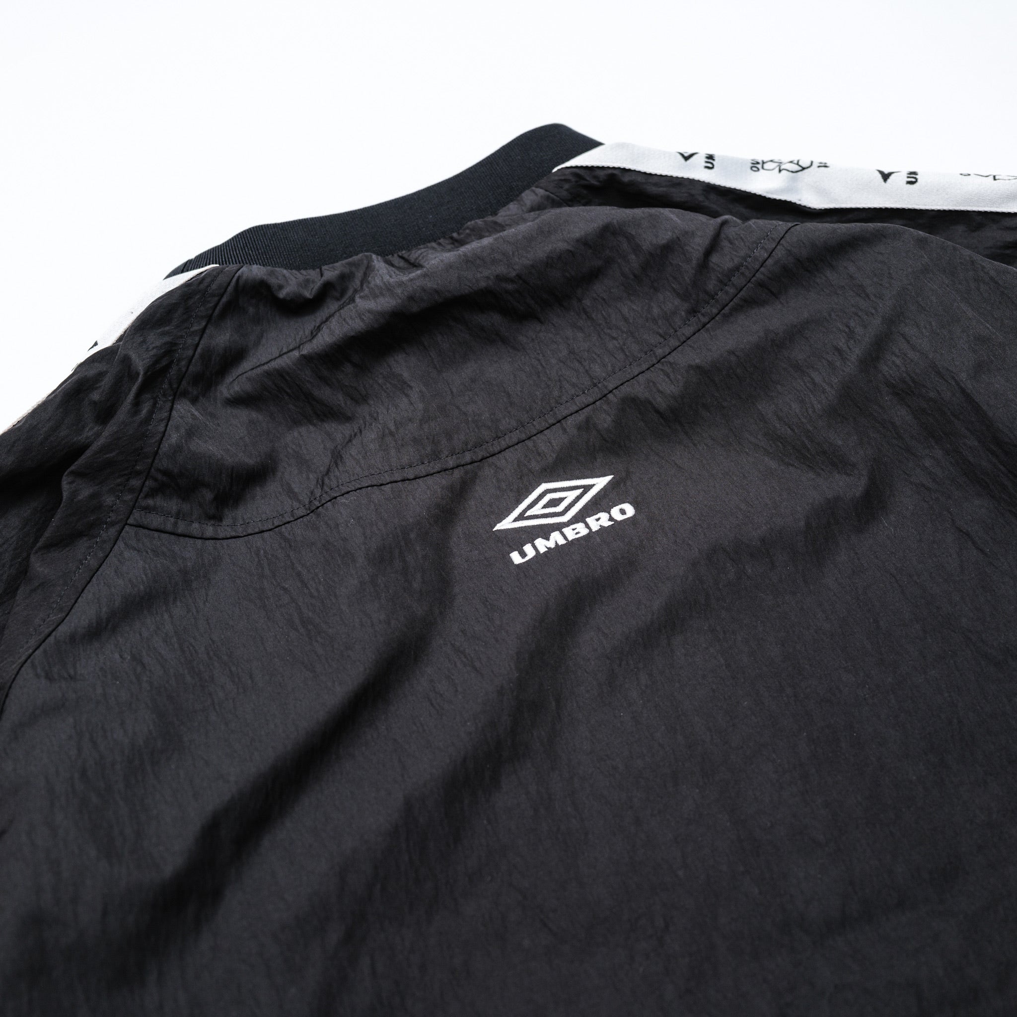 UMBRO * over print Drill top